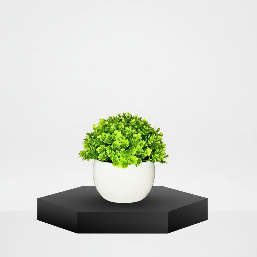 Artificial Green Foliage Plant in Round White Decorative Pot