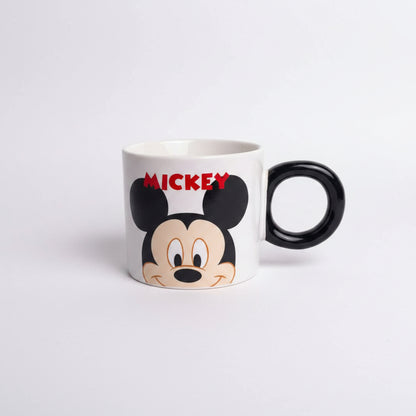 Mickey Mouse mug with black handle on a white background